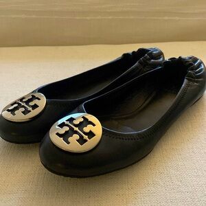 Classic Tory Burch flats with silver emblem